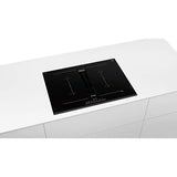 Plita incorporabila Bosch PVQ731F15E, Inductie, 4 zone de gatit, Mod hota integrat, Timer, QuickStart, Detectare vase, 70cm, Negru