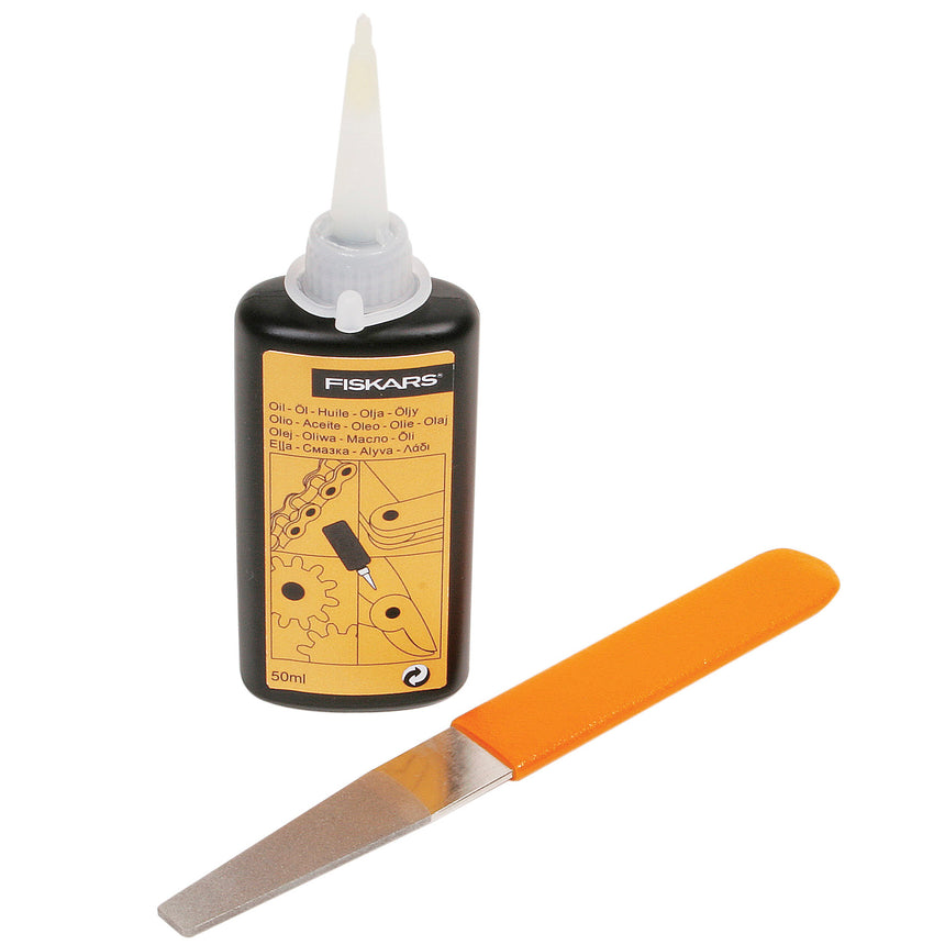 Set pentru intretinere unelte de gradina Fiskars,contine pila diamantata + ulei + ghid intretinere unelte