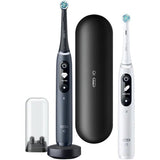 Set 2 x Periuta de dinti electrica Oral-B iO7 cu Tehnologie Magnetica si Micro-Vibratii, Inteligenta artificiala, Display led interactiv, Senzor de presiune Smart, Timer vizibil, 5 moduri, 1 incarcator magnetic, 1 Trusa de calatorie, Negru/Alb